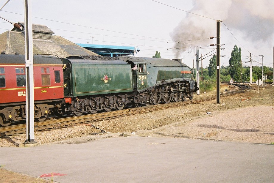 60009 Union of South Africa backs onto the train at York. Thursday 09/08/2007.