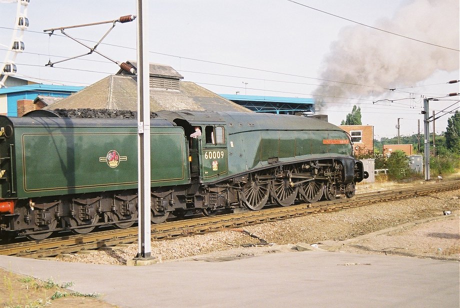 60009 Union of South Africa backs onto the train at York. Thursday 09/08/2007.