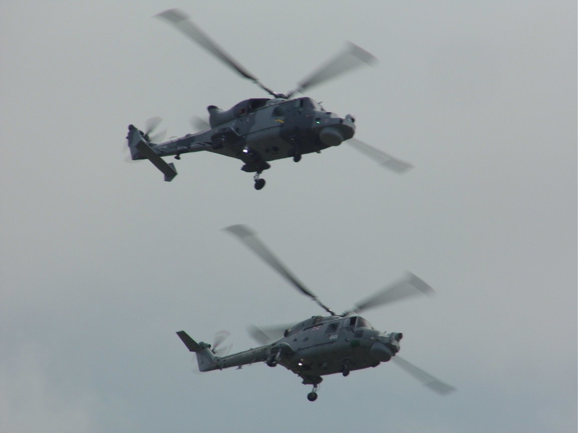 Brand new Wildcat (top) with Lynx, RAF Waddington 6th July 2014.